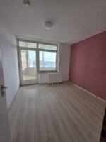 Schlafzimmer mit Balkonzugang