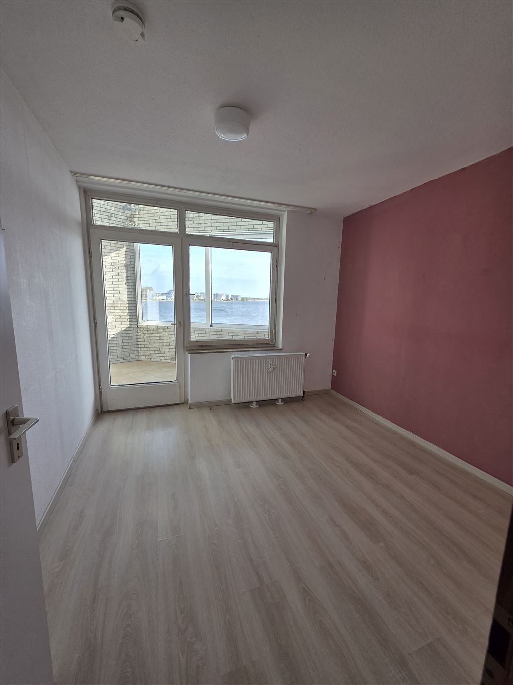 Schlafzimmer mit Balkonzugang